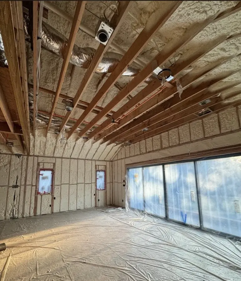 Interior walls and ceiling insulated with spray foam during new construction in Warrenville